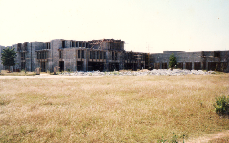 Dr. B V Doshi, visionary architect of IIMB, deeply engaged in a discussion with employees of the Institute.