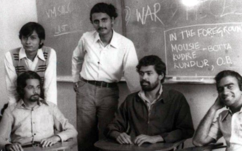 Students from First PGP batch (1974-76) causally seated inside the classroom.