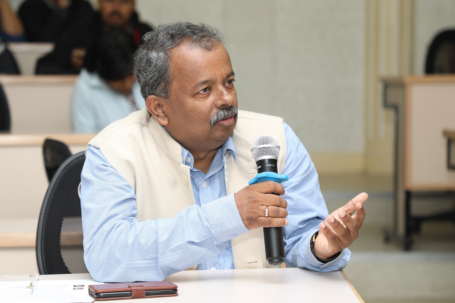 Professor Gopal Naik, Dean, Faculty, welcomes the speakers and audience to the Research Week at IIMB on December 26, 2019.